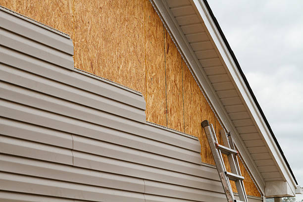 Professional Siding Installation technician working in Falkland, NC